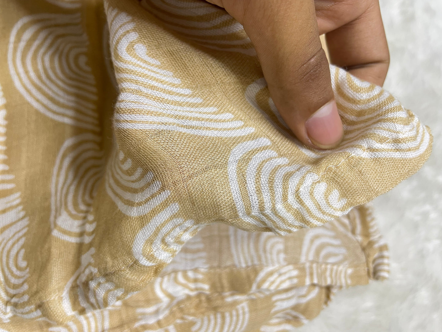 100% Muslin Baby Swaddle โ Minimalist Design with Soft Pastel Colours